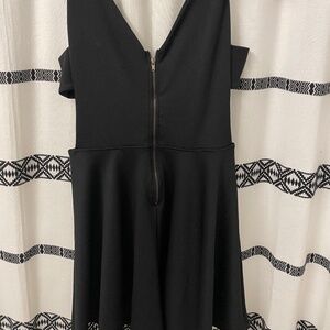 Black mini dress size M never worn sides out